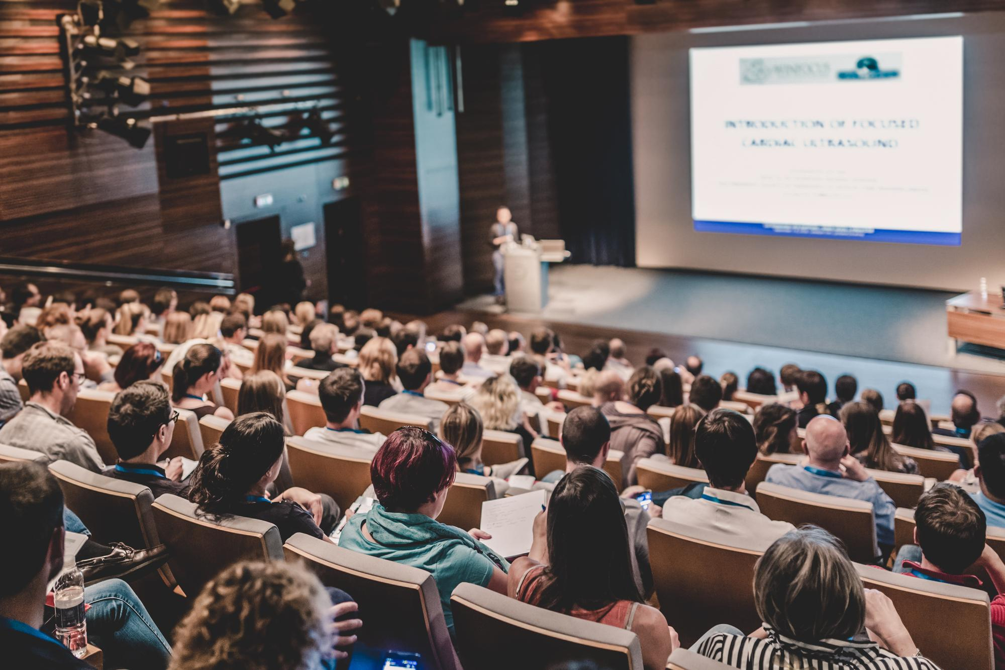 speaker giving talk scientific conference audience conference hall business entrepreneurship concept