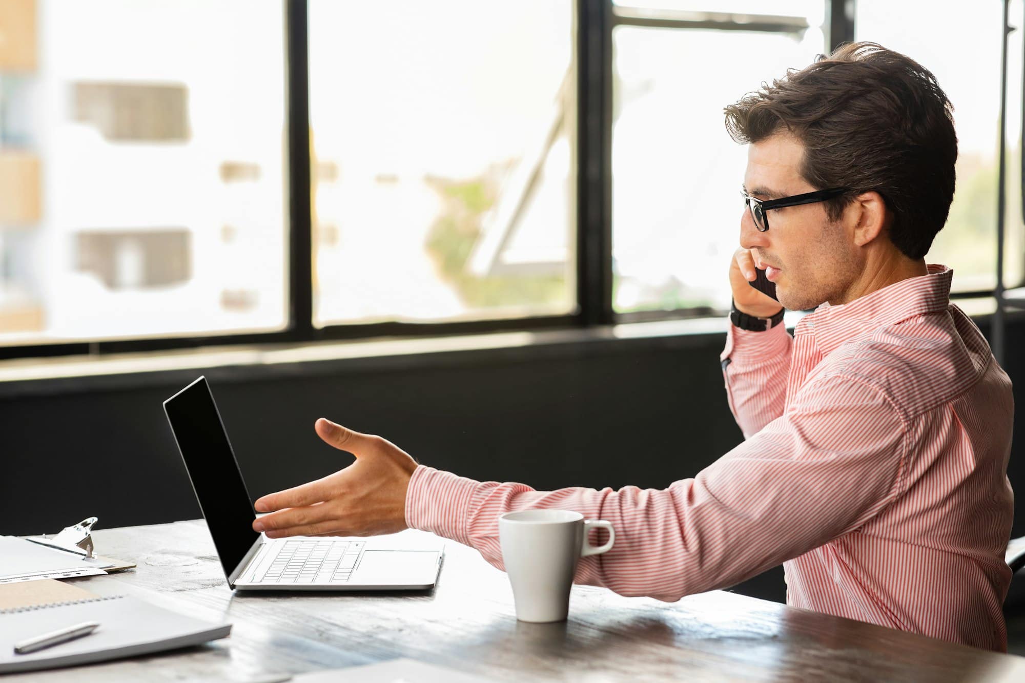 Businessman working at office, have phone call